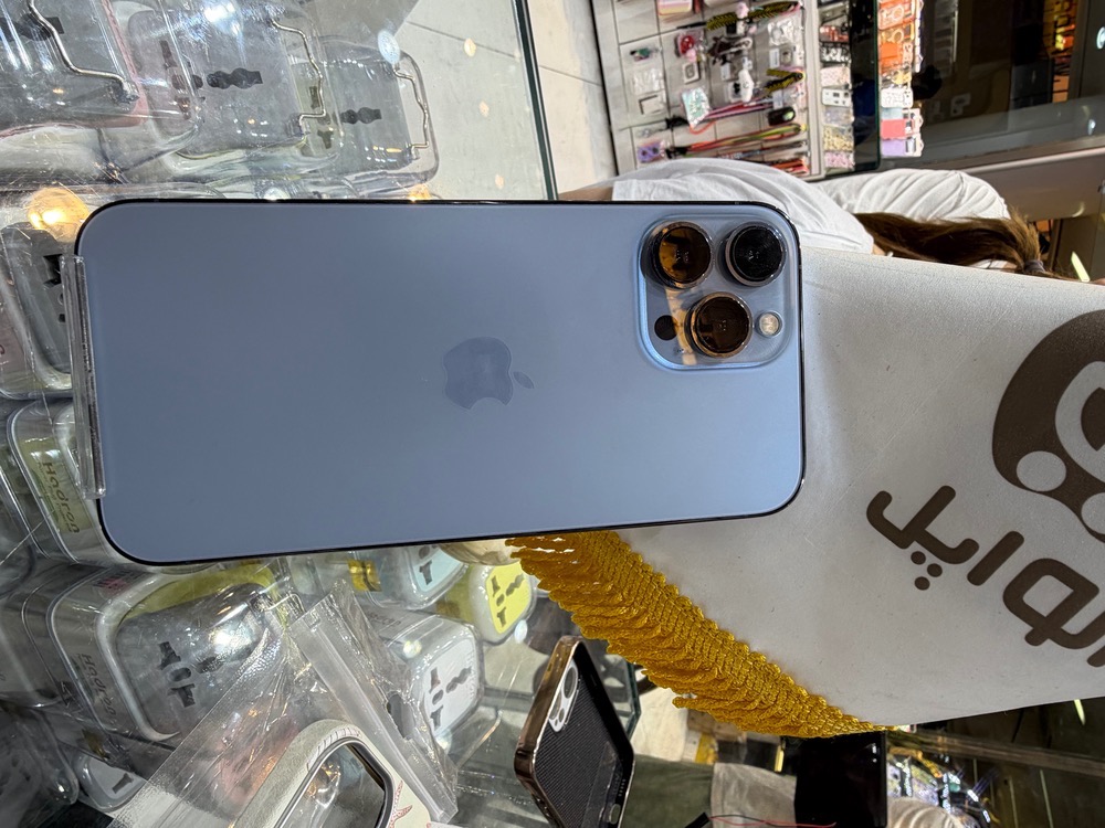کارکرده : آیفون 13 پرومکس حافظه 256 گیگابایت و رم 6 گیگابایت آبی سنگاپور iPhone 13 Pro Max 256 Gb Blue ZAA